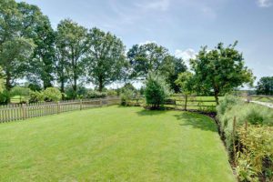 Enclosed lawn area for guests at Birchley House Farm